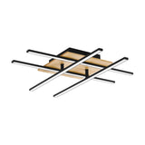 Marinello 1 LED flush ceiling light with four crosshatched black bars over a square natural wood plate, integrated white diffusers, shown on a plain white background.