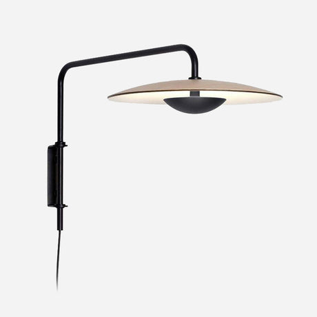 The Ginger LED Wall Light - Black & Oak features a sleek design with a black metal arm and a circular, UFO-shaped shade, embodying minimalist lighting. It is displayed against a plain white background.