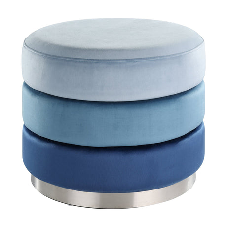 Mashike Round Pouffe in Blue, a tiered velvet footstool graded from pale to deep navy blue on a silver metal base, shown on a plain white background.