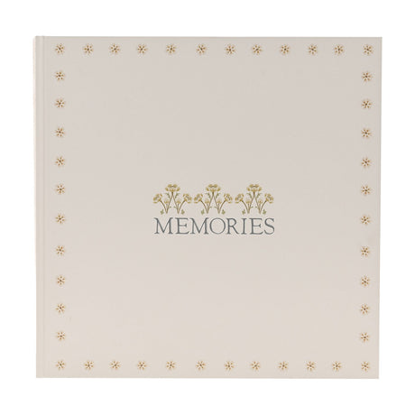 Square Memories photo album with cream linen cover, bordered by a small floral pattern, gold floral sprigs above grey "MEMORIES" lettering, shown on a plain white background.