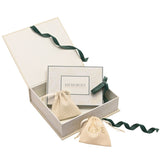 Square cream keepsake box open with floral-patterned lid and sides, green ribbon tie, holding a small "Memories" card and two drawstring pouches, one reading "Love", on a white background.