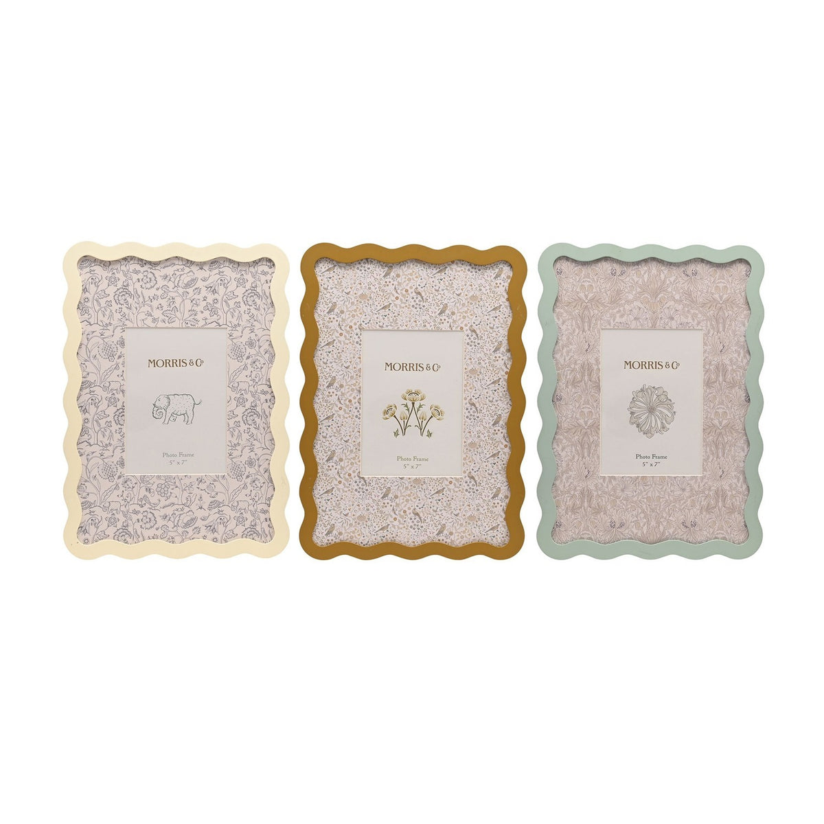 Set of 3 rectangular photo frames with wavy edges in cream, ochre and sage green, each with a patterned mat holding a 5 x 7in photo, shown on a white background.