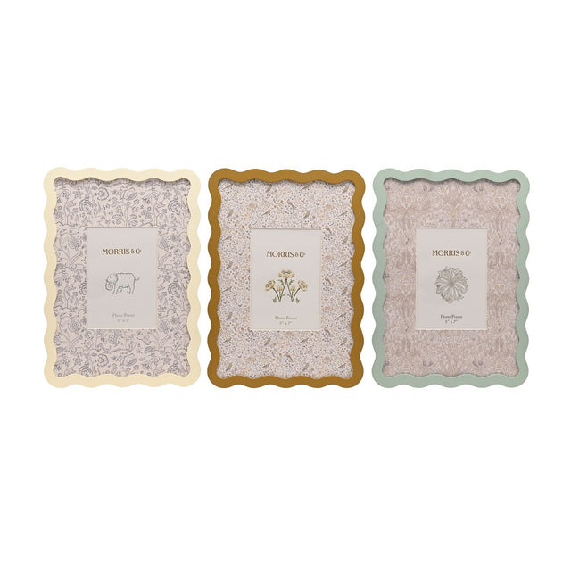 Set of 3 rectangular photo frames with wavy edges in cream, ochre and sage green, each with a patterned mat holding a 5 x 7in photo, shown on a white background.