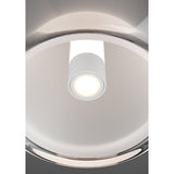 Menorca LED Ceiling Light in black nickel, close-up view showing the round glossy canopy and white cylindrical LED module with a lit frosted glass diffuser.