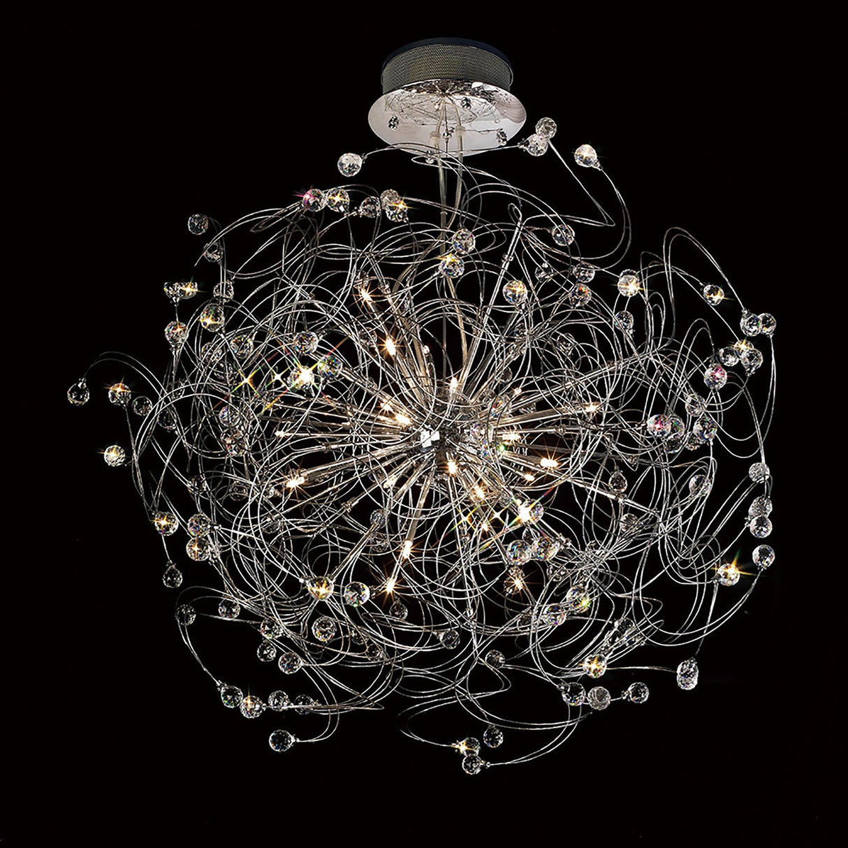 Diyas Messe 24 light crystal semi-flush ceiling light in polished chrome with looping wires and faceted crystal spheres, shown lit on black.