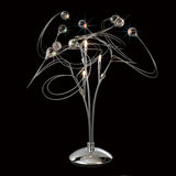 The Messe 3 Light Crystal Table Lamp in polished chrome features curved metal arms, small lights, and Asfour crystal spheres for a striking starburst effect against a black background.