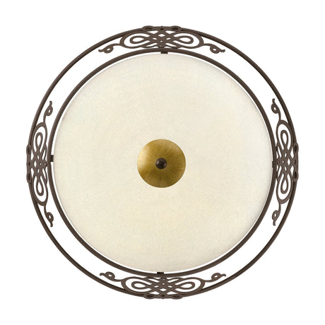 Mestre flush ceiling light with round beige chalked glass bowl, ornate antique brown steel frame with scrolled knotwork, and a gold-toned centre finial, on a white background.