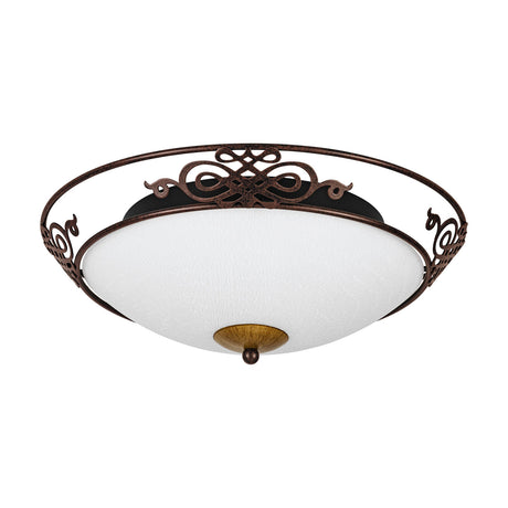 Mestre flush ceiling light with a frosted white glass bowl, antique brown and gold scrolled steel frame, and central gold finial, shown on a plain white background.