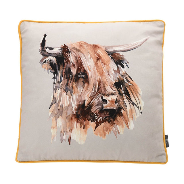 Square cushion in light grey with a watercolour highland cow design in brown, rust and cream tones, pale horns, and mustard-yellow piped edging, shown on a plain white background.