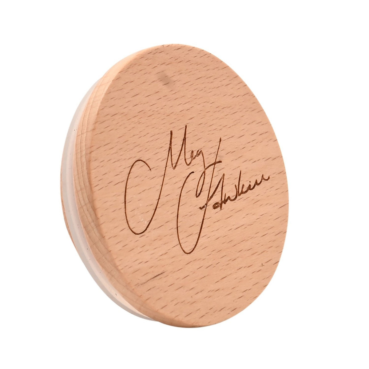 Round wooden lidded candle from the Donkey, Pheasant & Bee set, engraved with a cursive "Meg Hawkins" signature, shown at an angle on a white background.