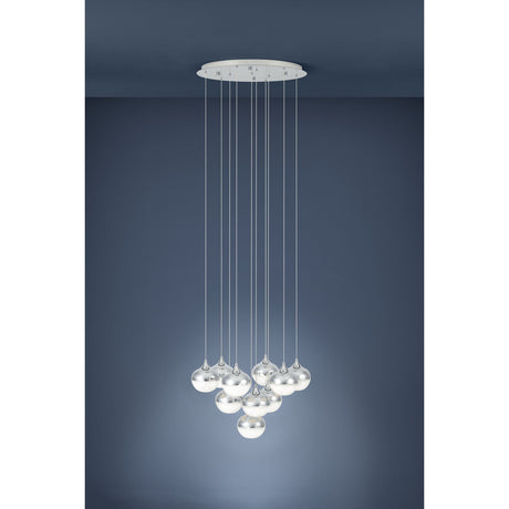 Chrome Mioglia 10-light pendant with staggered globe shades, each chrome-topped with a textured clear lower half, illuminated against a dark blue background.