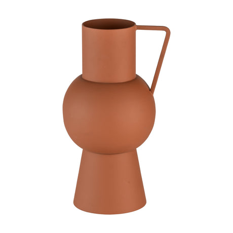 Miouski Metal Vase 22cm in Terracotta, a pitcher-shaped vase with cylindrical neck, round body, flared conical base and angular handle, shown on a plain white background.