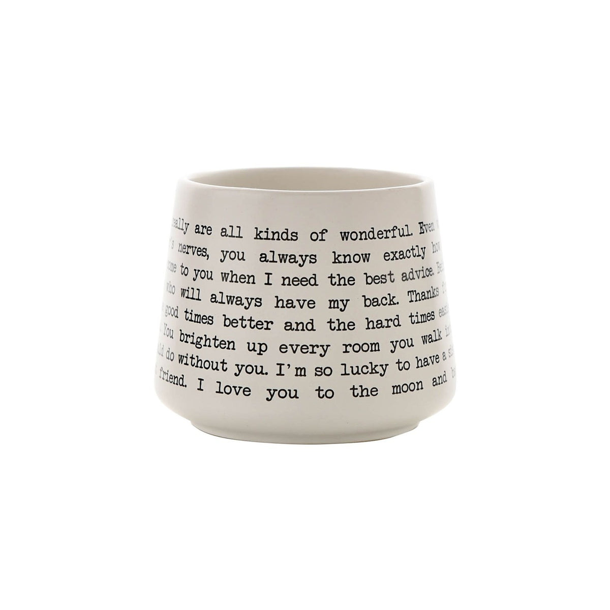 White stoneware mug printed with black typewriter-style script reading a sister message, photographed on a plain white background.