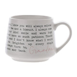White matt stoneware mug with tapered shape and handle, featuring a black typewriter-style verse for Grandma and the name in pink script, shown on a plain white background.