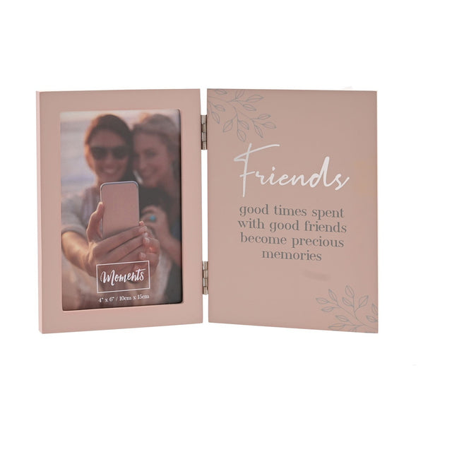 Hinged matt pink wooden photo frame holding a 6 x 4in photo on one side and a white script "Friends" verse on the other, set against a white background.