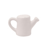 Mini ceramic watering can ornament in off white, with a rounded drum body, curved loop handle, and angled spout, shown on a plain white background.