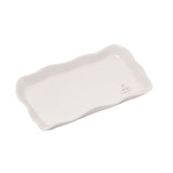 Off-white stoneware rectangular plate with a softly waved, scalloped rim and a small heart and "eat the TREAT" text in one corner, shown on a plain white background.