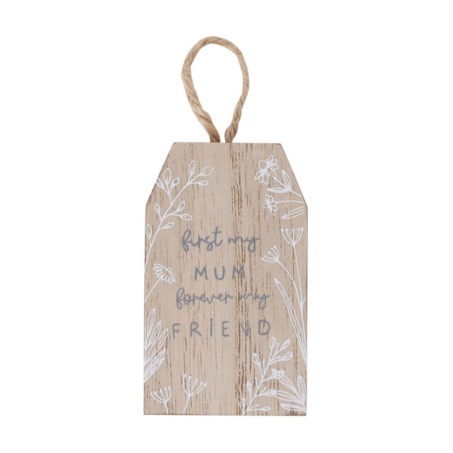 Mini hanging wooden plaque with first my MUM forever my FRIEND in grey and white lettering, framed by white wildflower drawings and a jute hanging loop.