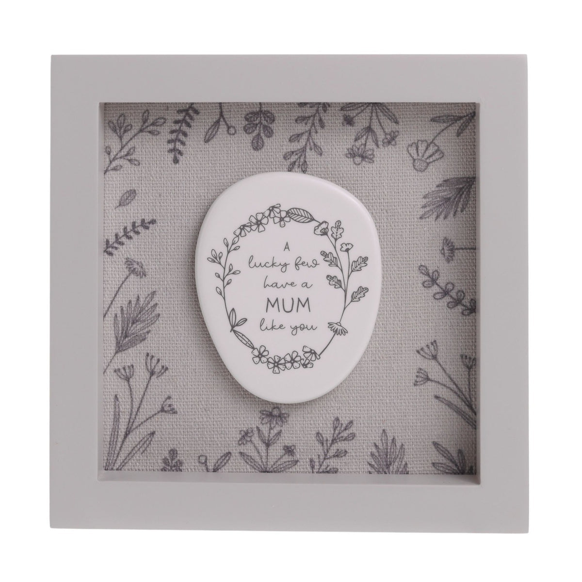 Square grey wood-framed plaque, 15cm x 15cm, with a white pebble-shaped oval reading "A lucky few have a MUM like you" within a floral wreath, set against a wildflower-print background.
