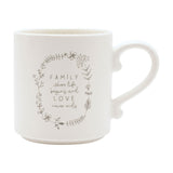 Cream ceramic mug with curved handle, featuring a grey floral wreath design and "FAMILY where life begins and LOVE never ends" text, shown on a plain white background.