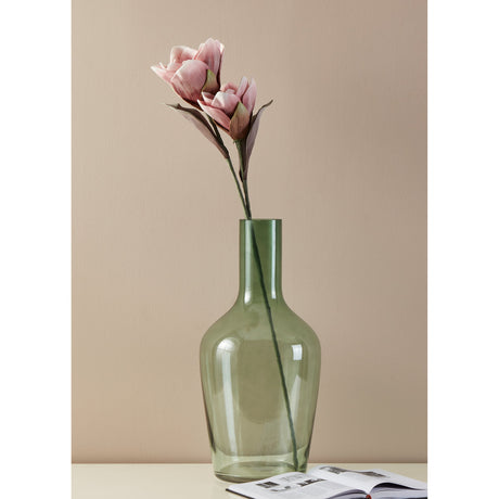 Molave Artificial Flower 83cm in pink and white, with magnolia-style blooms and a bud on a single stem, displayed in a green glass bottle vase against a neutral background.