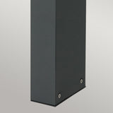 Close-up of the bottom half of a graphite, rectangular Molde LED Bollard made from die-cast aluminum, featuring two visible screws at the base against a light gray gradient background.