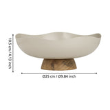 Monywa decorative bowl with wavy cream metal rim on a round wood pedestal base, shown with dimension labels Ø25cm and 10.5cm height on a white background.
