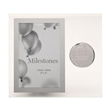 Glass photo frame with bevelled edges, 6 x 4in rectangular picture window, and a round silver metal 18th birthday badge, set against a plain white background.