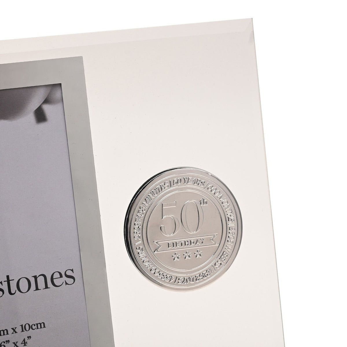 Clear glass photo frame with 6 x 4in portrait opening and silver-grey border, featuring a round silver metal 50th Birthday badge with star details beside the picture.