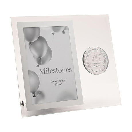 70th Birthday clear glass photo frame with silver border 6x4in opening and round silver metal badge reading "70th Birthday" with three stars, shown with a sample balloon photo.