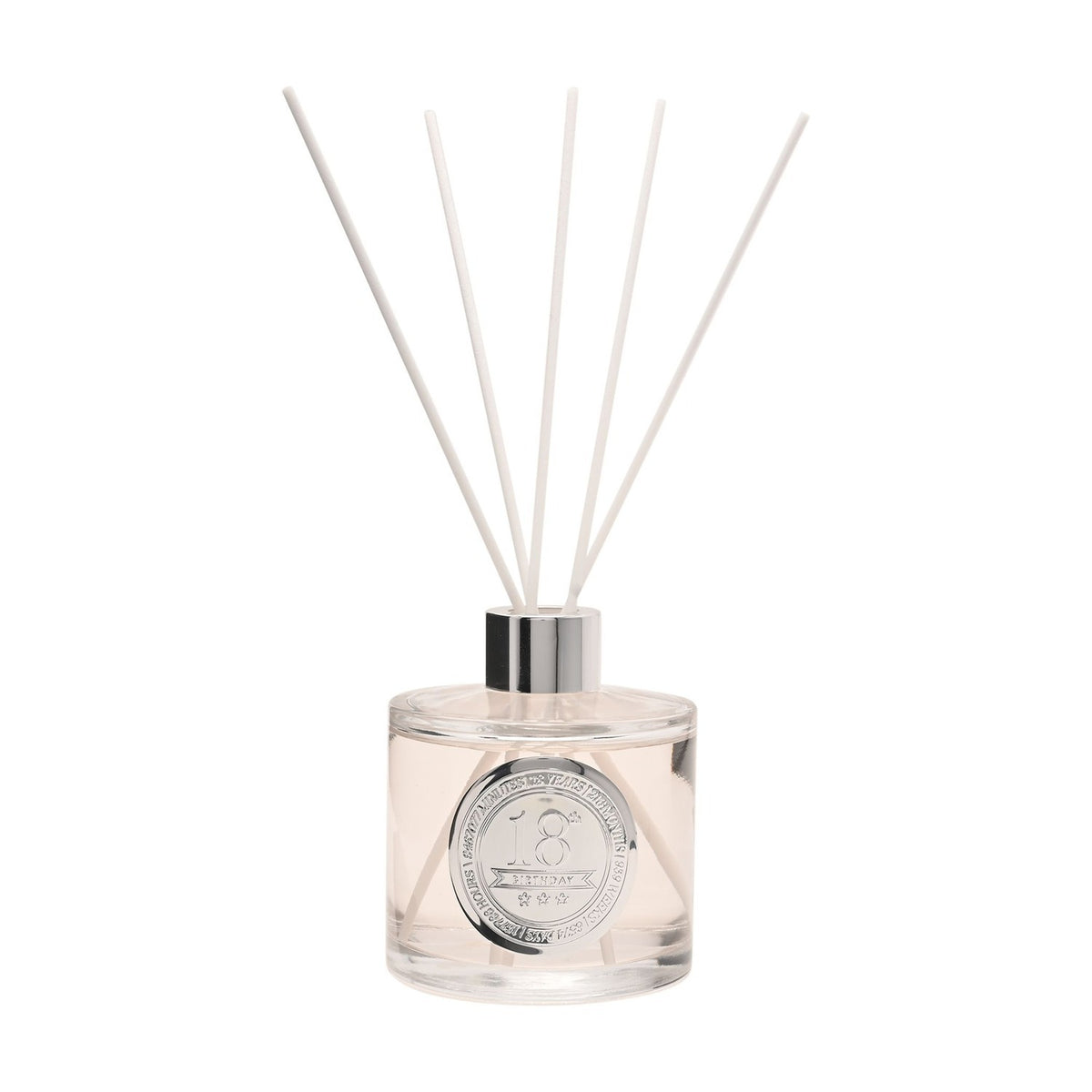 18th Birthday Sandalwood Reed Diffuser, round clear 200ml bottle with pale blush liquid, silver collar and white reeds, set on a plain white background.