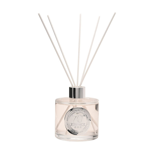 70th Birthday Sandalwood Reed Diffuser 200ml in a clear glass bottle with silver cap, round silver "70th Birthday" medallion label, and white reeds, on a plain white background.