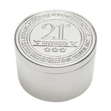Round silver metal trinket box with embossed lid reading "21st Birthday" above three stars, bordered by engraved time units, shown on a white background.