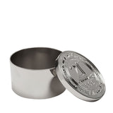 Round silver metal trinket box with lid resting open beside it, the lid embossed with "21st Birthday" and a decorative bordered edge, shown on a plain white background.