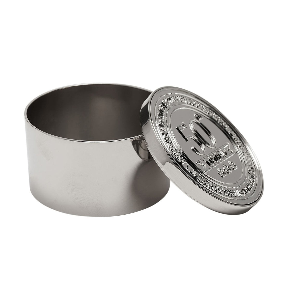 Round silver metal trinket box with lid propped beside its open cylindrical base, lid embossed with "50" birthday design and surrounding text, on a plain white background.