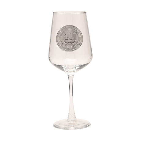 Clear stemmed wine glass with a round silver badge on the bowl featuring a bold "40" design, long slim stem, and round base, shown on a plain white background.