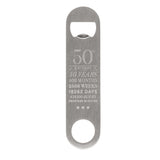 Brushed silver flat bottle opener engraved with "50th Birthday" milestone stats in years, months, weeks, days, hours and minutes, shown on a plain white background.