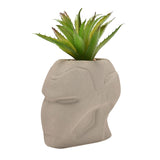 Iron Man Helmet planter in matt cement grey metal with raised facial detailing, holding a spiky green faux plant, shown on a plain white background.