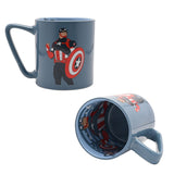 Blue porcelain Captain America mug shown upright with shield graphic and handle, alongside a tilted view revealing a printed interior design, on a plain white background.
