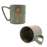 Green porcelain Avengers Groot mug, 500ml, shown front and tilted to reveal matching inside decal with Groot figures on a wood-grain patterned interior, plain white background.