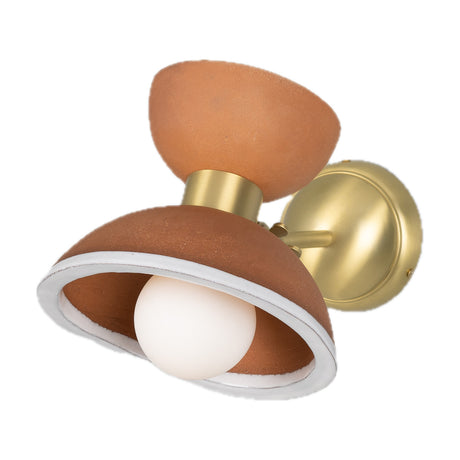 Nakaii ceramic wall light with two terracotta domes, lower rimmed in white, joined at a satin brass collar on a slim arm with round wall plate and visible opal glass bulb.