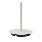 A close-up of the Natura 4 Light Outdoor Floor Lamp in Matt White/Opal White, featuring a minimalist circular base and vertical pole on a black platform—ideal for modern, sculptural outdoor lighting.