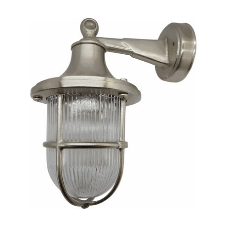 Tiller IP64 outdoor wall lantern in satin nickel, with a caged ribbed glass shade, flared hood, and arm bracket on a round wall plate, shown on a plain white background.