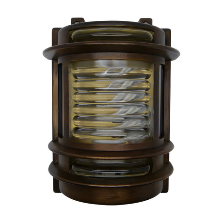 Cargo Outdoor Wall Light in antique brass, a solid brass bulkhead fitting with curved ribbed glass panel, tiered brass bands, and side glazing, shown on a plain white background.
