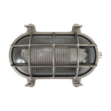 Horatio Oval Bulkhead Light in satin nickel, showing a ribbed glass cover behind a crossed bar cage with corner mounting lugs, IP64 rated, on a plain white background.