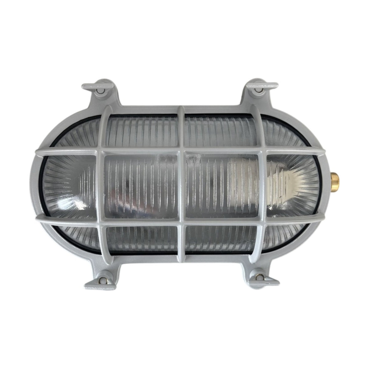 Horatio Oval Bulkhead Light IP64 in silver, showing a brass oval wall light with ribbed glass behind a protective cage and four corner mounting lugs, on a plain white background.