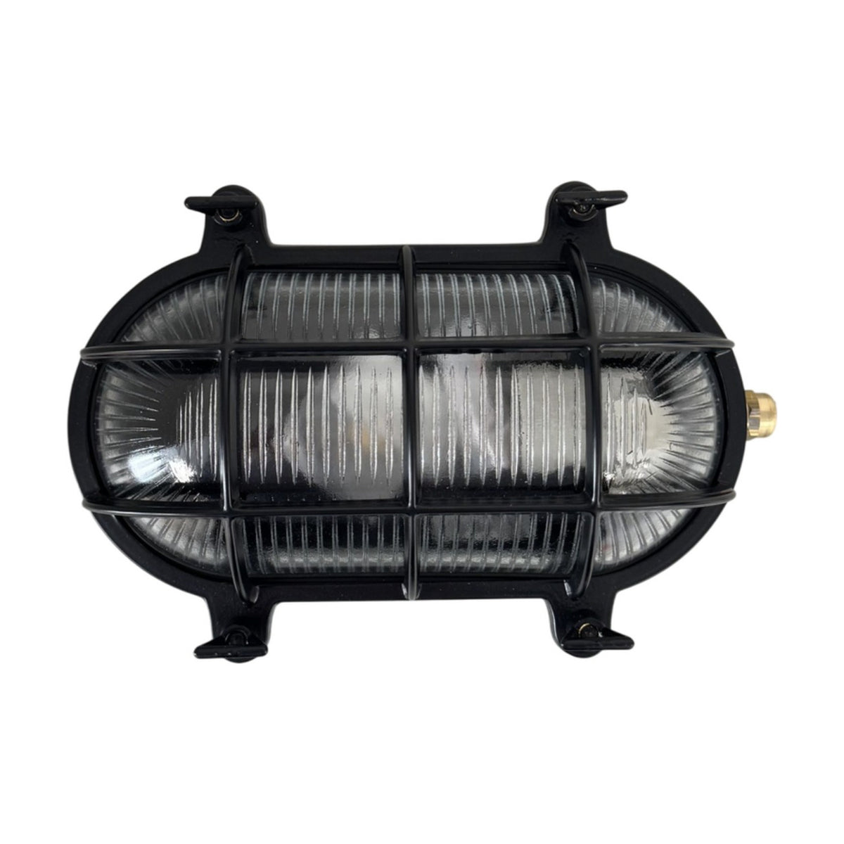Horatio Oval Bulkhead Light IP64 in black, showing a black metal cage grid over ribbed glass with a brass fitting, set against a plain white background.
