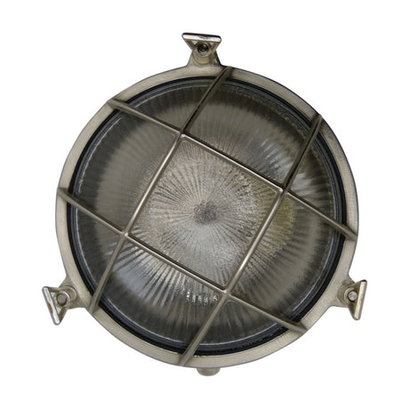 Grand Cabin round bulkhead light in satin nickel, with a brass body, grid cage over ribbed glass, and mounting lugs, shown against a plain white background.