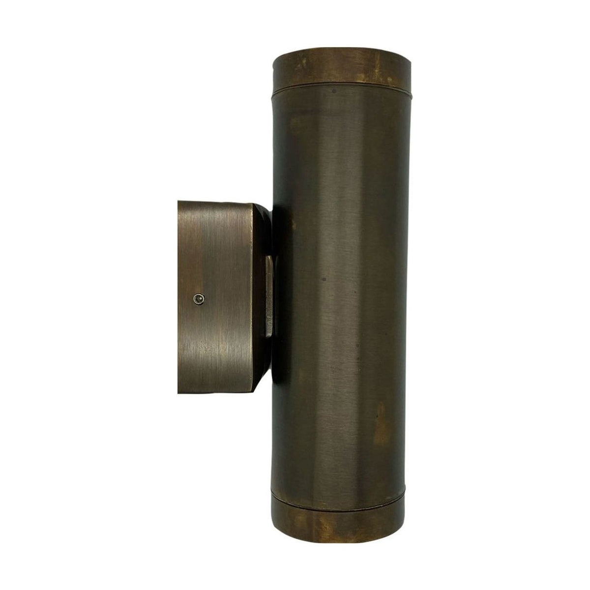 Pharos outdoor up & down wall light in antique brass, solid brass cylinder with banded end caps on a square mounting block, IP64 rated, shown on a plain white background.