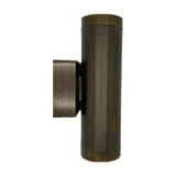 Pharos outdoor up & down wall light in antique brass, solid brass cylinder with banded end caps on a square mounting block, IP64 rated, shown on a plain white background.